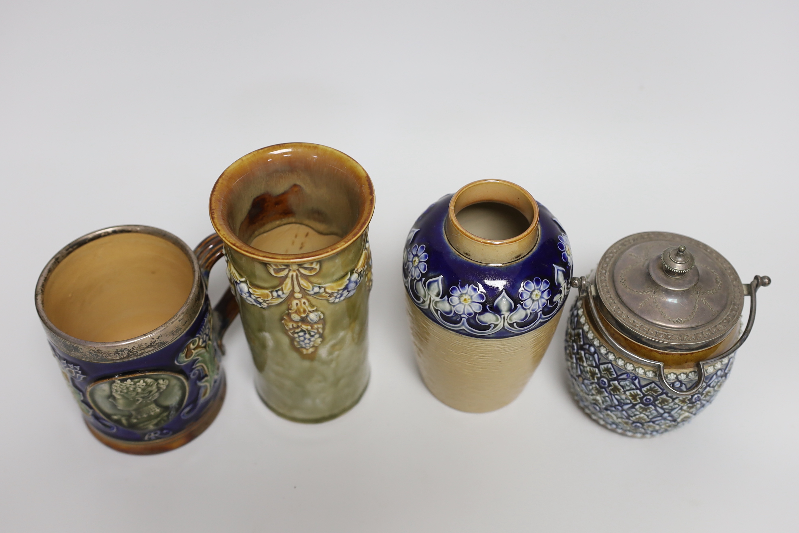 A Doulton Lambeth stoneware silver mounted jar and cover, two vases and a commemorative mug, tallest 15cm